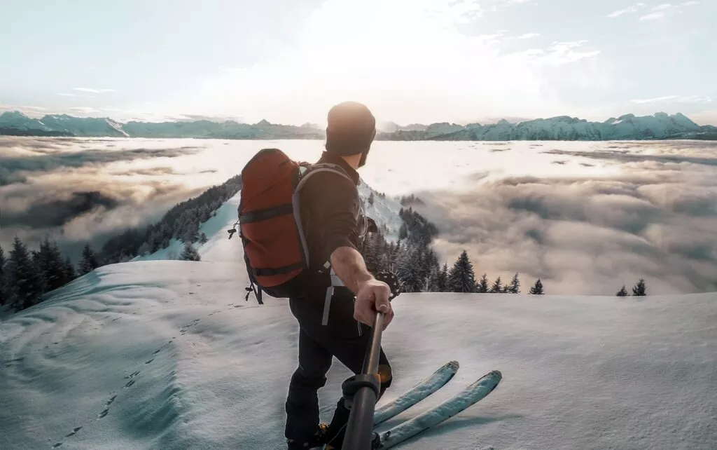 man holding a gopro