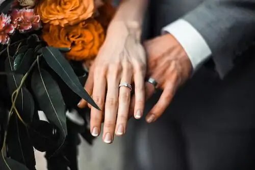 couple wearing rings